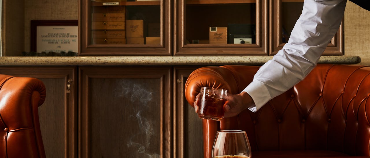 Connoisseur’s Corner offers exceptional cognacs and a premium selection of cigars to purhcase. .
