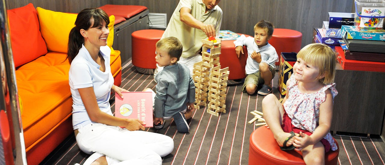 Families are welcome and offered a room full of activities for kids
