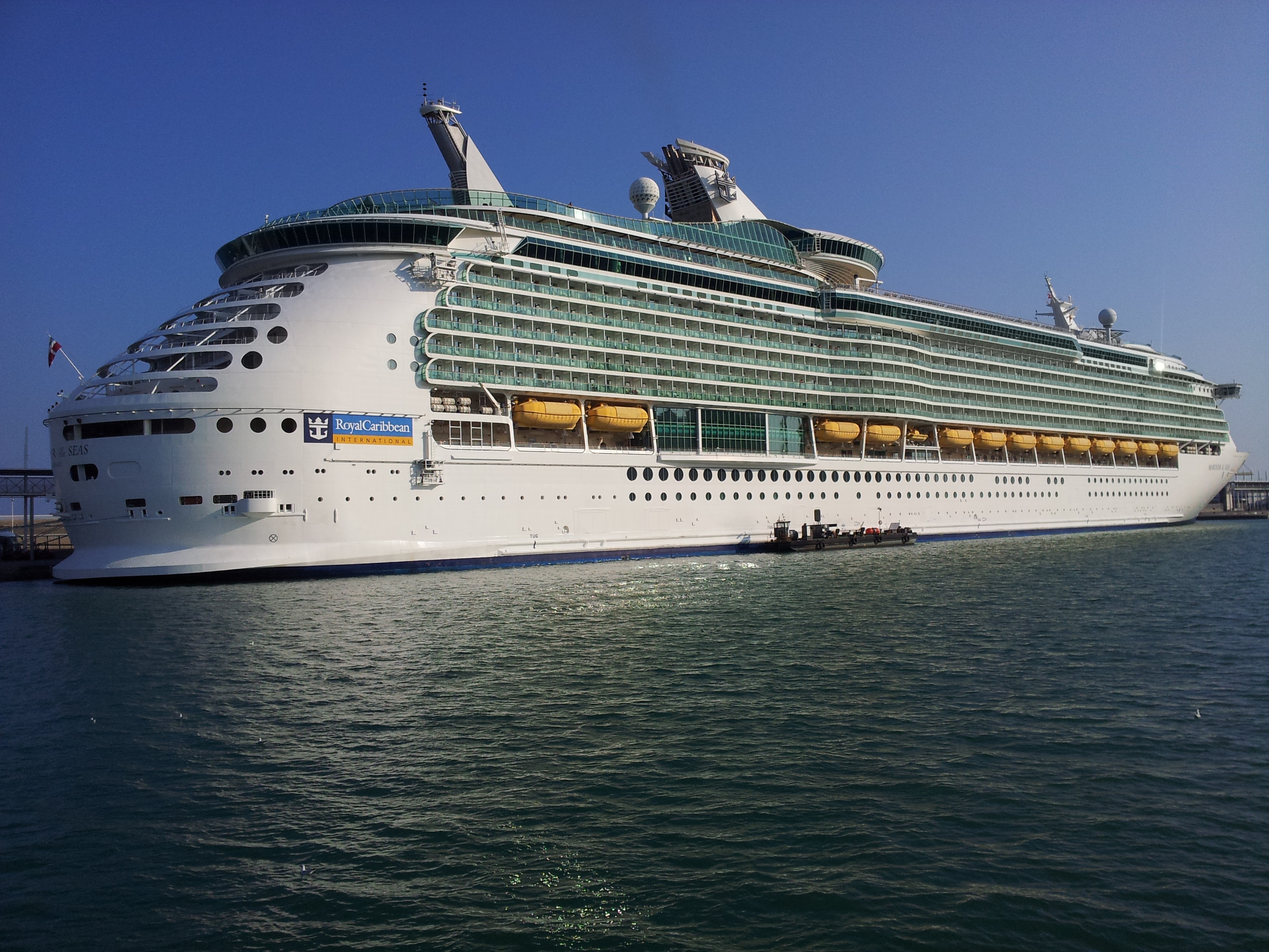 royal caribbean cruise ship docked on the water

